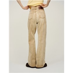 Бежевые джинсы с рельефными швами