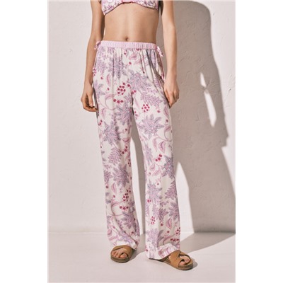 Pantalón largo estampado flores rosa