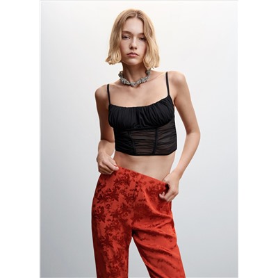 Top corsetero semitransparente