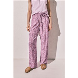 Pantalón largo estampado flores rosa