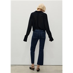 Jeans flare crop bolsillos