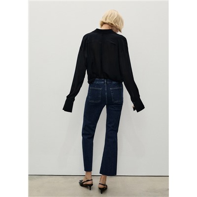 Jeans flare crop bolsillos