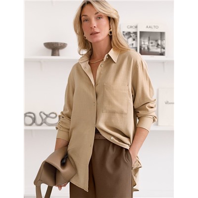 Свободная удлиненная блузка с карманом изо льна с вискозой