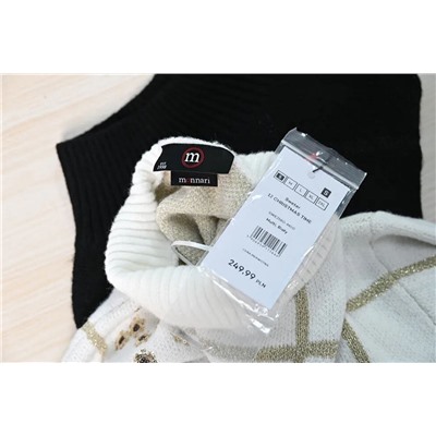 Элегантный и свободный трикотажный свитер