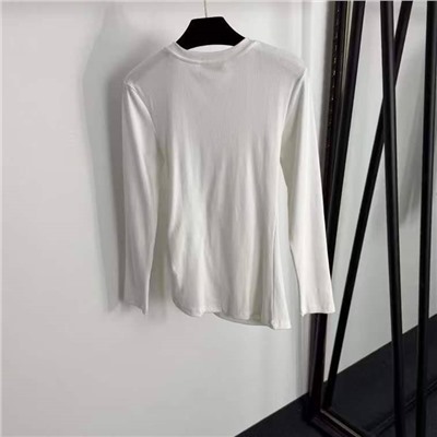 Женский лонгслив Schiaparell*i с защипами на талии и металлической брошью