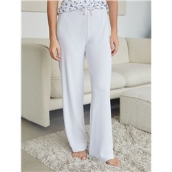 Прямые брюки с поясом на резинке из фактурного трикотажа в рубчик