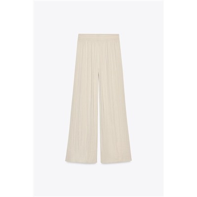 WIDE FLOWING TROUSERS