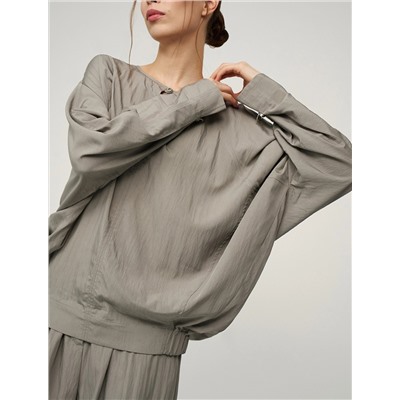 Зеленая блузка «Паук» с кольцом на рукаве