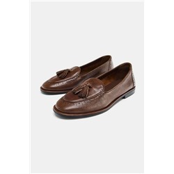 MOCASÍN BORLAS PIEL