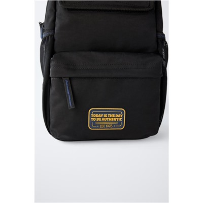 CROSSBODY BACKPACK WITH MULTIPLE POCKETS