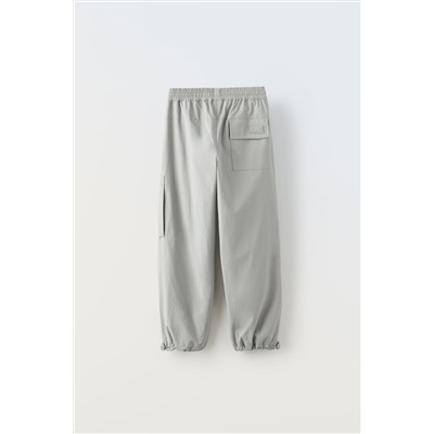 LINED NYLON TROUSERS