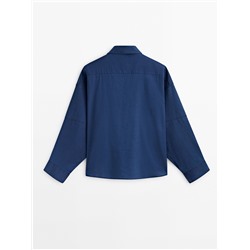 Camisa algodón bolsillos detalle mangas