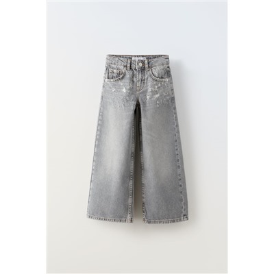 STRAIGHT-FIT RIPPED JEANS