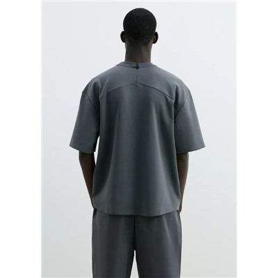 Camiseta bolsillo cremallera