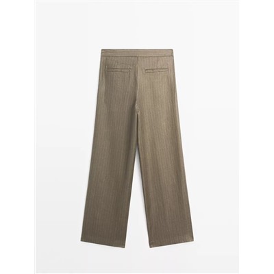 100% linen striped trousers with buckle detail