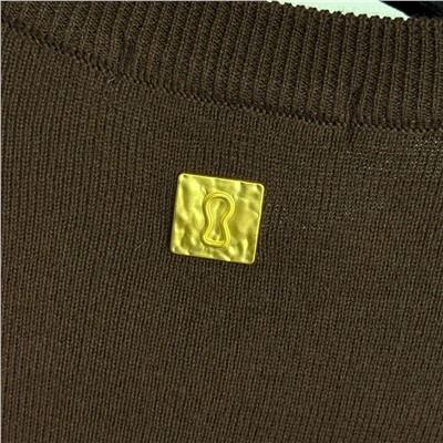 Прямое трикотажное платье с декоративными золотыми пуговицами особой формы с длинными рукавами  Schiaparell*i