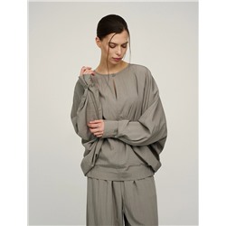 Зеленая блузка «Паук» с кольцом на рукаве