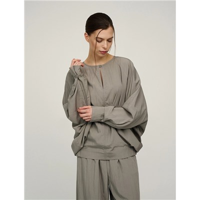 Зеленая блузка «Паук» с кольцом на рукаве