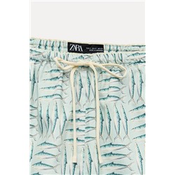 FIGURATIVE PRINT SHORTS