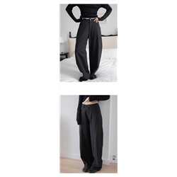 Свободные брюки с широкими штанинами с косой строчкой впереди