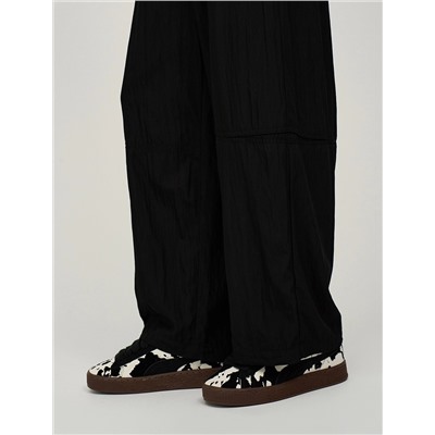 Черные брюки с вырезом ниже колена