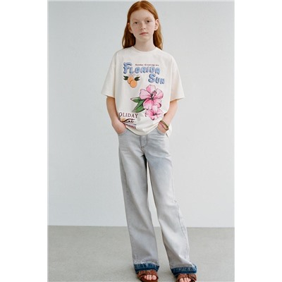 FLARED JEANS WITH RAW HEMS