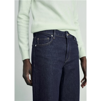 Jeans rinse wash bajo vuelto