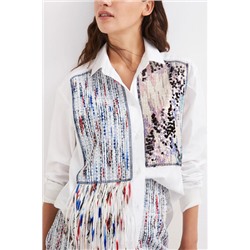 Camisa de patch y flecos