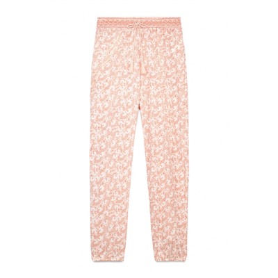 Pantalón skinny 100% algodón flores naranja