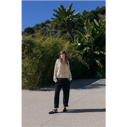 CARROT-FIT TROUSERS WITH CUFFED HEMS