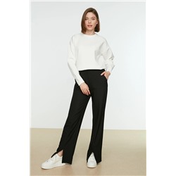 TRENDYOL MODEST Siyah Yüksek Bel Yırtmaç Detaylı Cepli Dokuma Pantolon TCTSS22PL0367