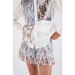 Camisa de patch y flecos