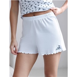 Короткие шорты на резинке с вышивкой из фактурного трикотажа в мелкий рубчик