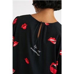 Blusa vaporosa bocas