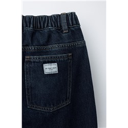 PLEATED BALLOON-FIT DENIM TROUSERS