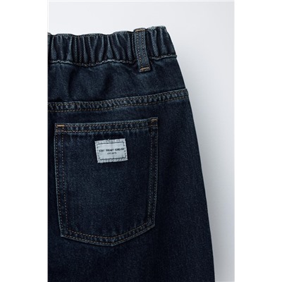 PLEATED BALLOON-FIT DENIM TROUSERS