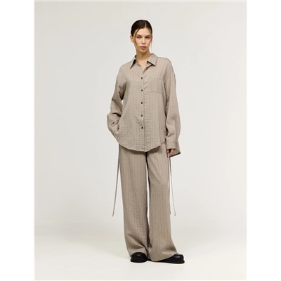 Бежевые брюки в полоску