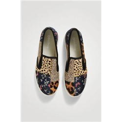 Sneakers slip on de piel