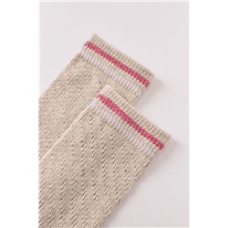 Calcetines largos beige textura lurex