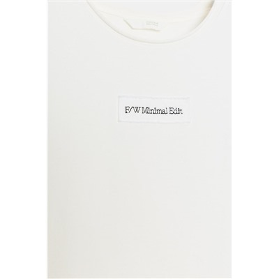 EMBROIDERED SLOGAN T-SHIRT