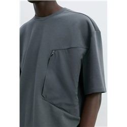 Camiseta bolsillo cremallera