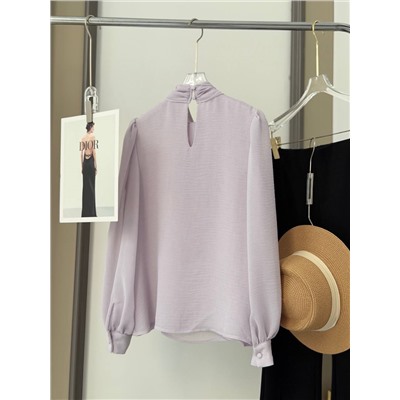 Элегантная, нежная блузка с длинными лентами на горловине