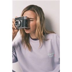 Pantalón largo flare felpa lila