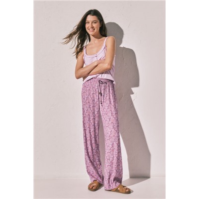 Pantalón largo estampado flores rosa