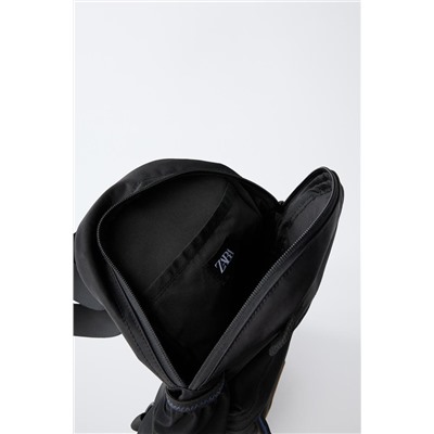 CROSSBODY BACKPACK WITH MULTIPLE POCKETS