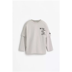 Camiseta doble manga