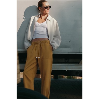 JOGGER TROUSERS WITH BUTTONED HEMS