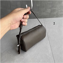 Маленькая женская сумка-тубус из натуральной кожи