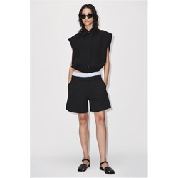 CHALECO CUELLO CAMISERO BOLSILLOS