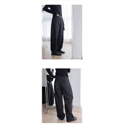 Свободные брюки с широкими штанинами с косой строчкой впереди